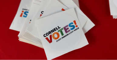 Cornell Votes stickers on table